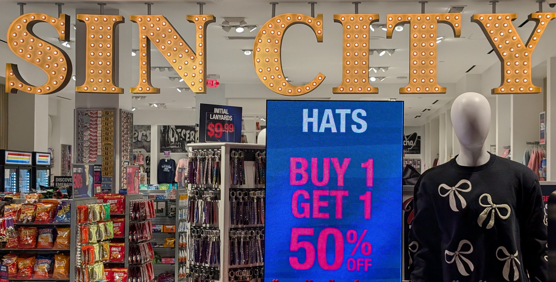 SIN CITY Verkaufsschild mit blauer Werbeanzeige 